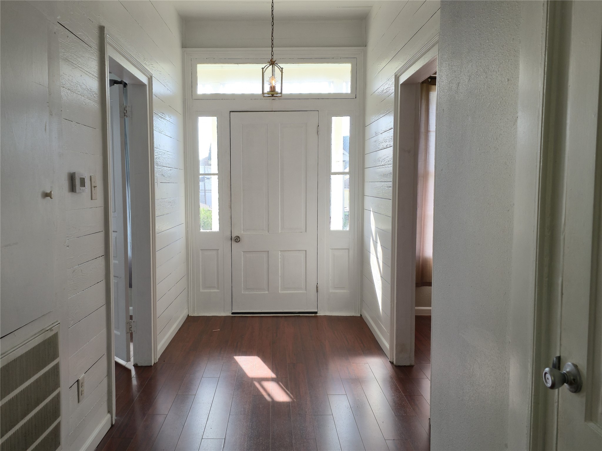 1614 Market Street, Unit 2 Galveston, TX 77550 - Photo 6 of 22 a view of a hallway with wooden floor