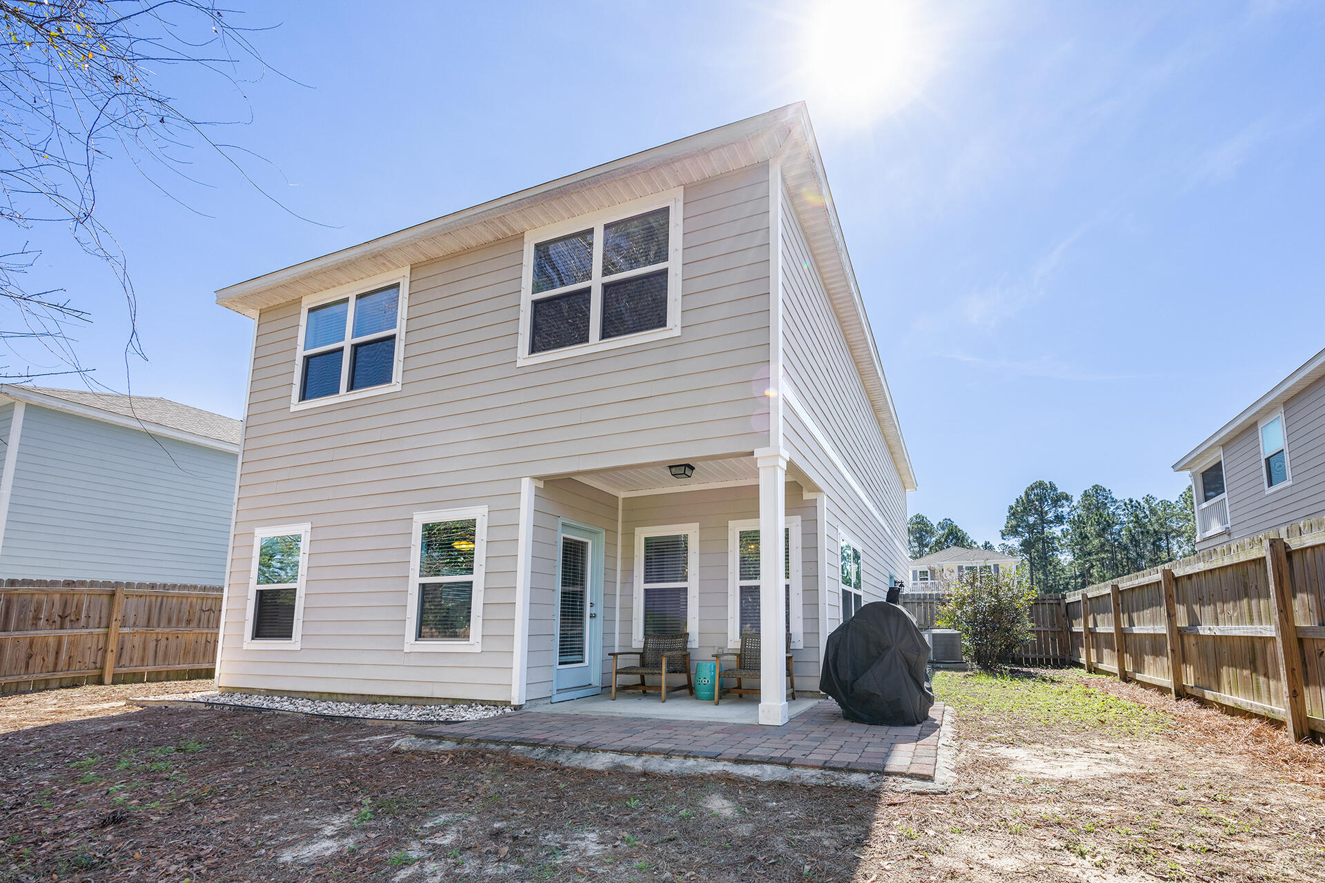 52 Tranquility Lane Santa Rosa Beach, FL 32459 - Photo 13 of 31 a view of a brick house with a yard