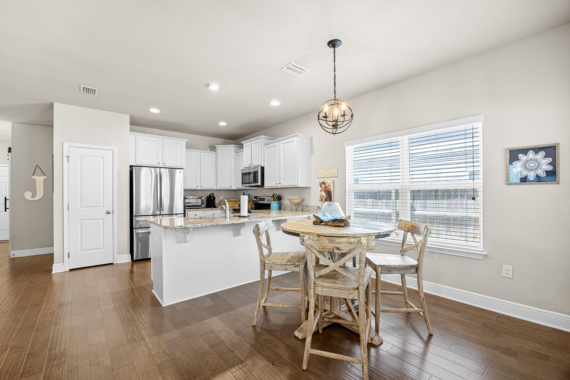 52 Tranquility Lane Santa Rosa Beach, FL 32459 - Photo 16 of 31 a view of kitchen with refrigerator and window