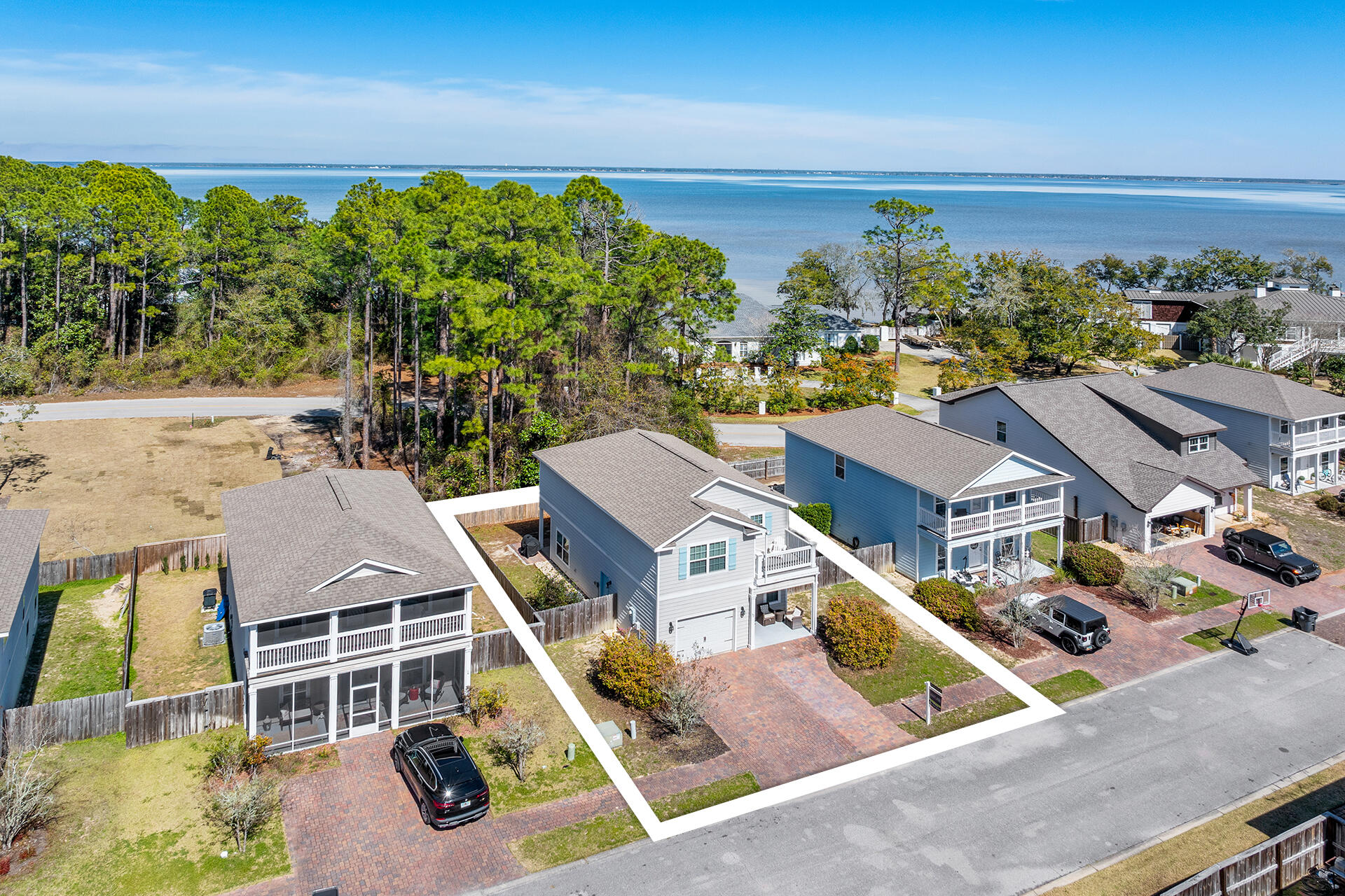 52 Tranquility Lane Santa Rosa Beach, FL 32459 - Photo 2 of 31 an aerial view of multiple houses with a yard