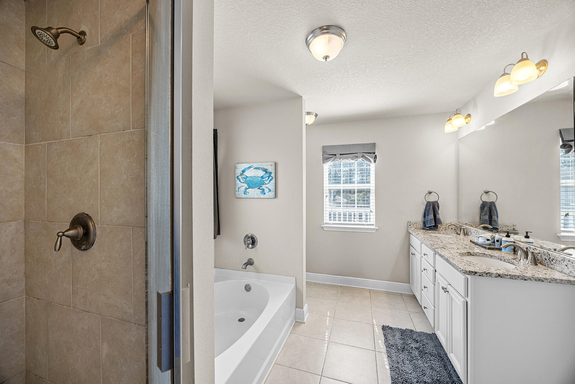 52 Tranquility Lane Santa Rosa Beach, FL 32459 - Photo 23 of 31 a bathroom with a tub sink and mirror
