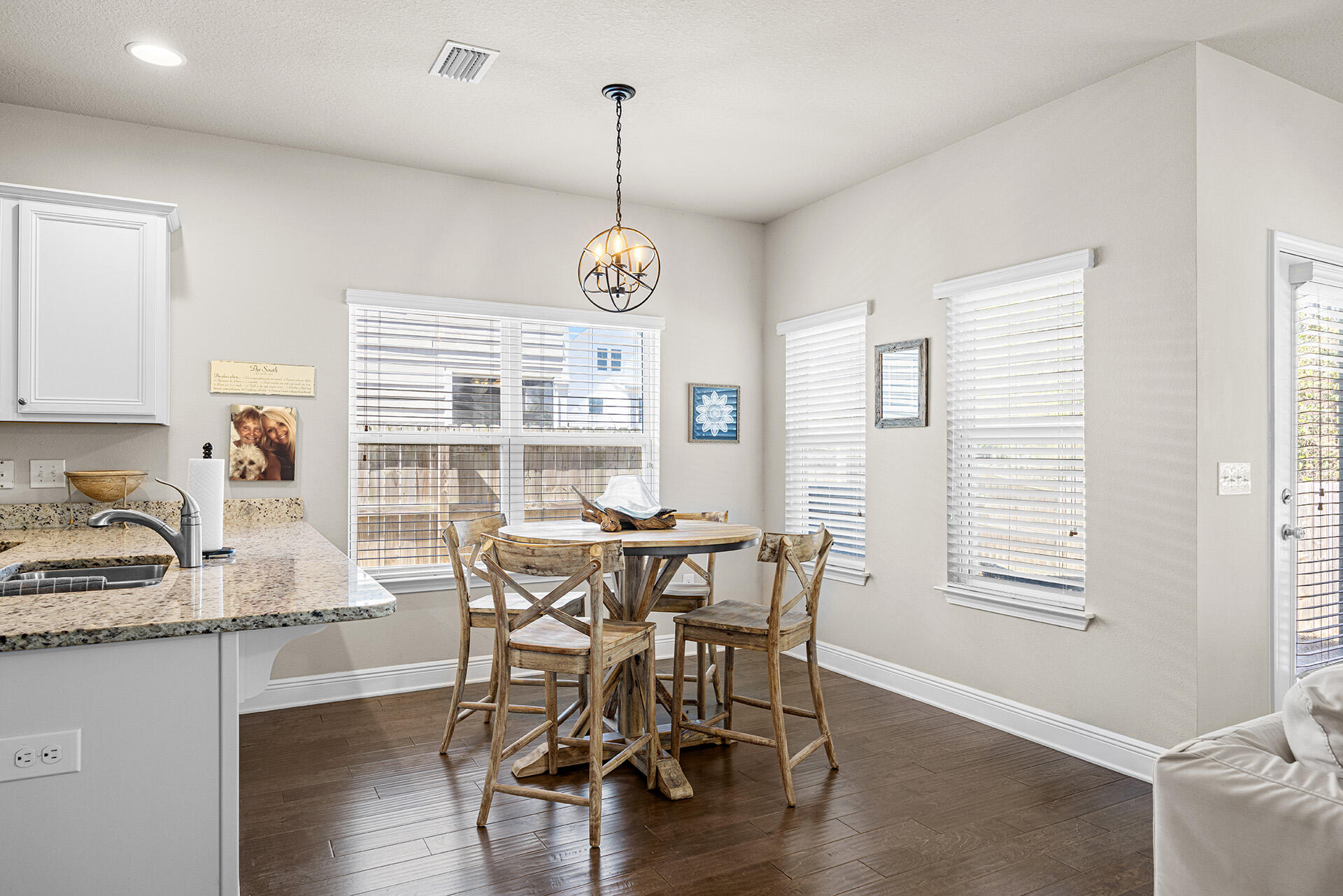 52 Tranquility Lane Santa Rosa Beach, FL 32459 - Photo 31 of 31 a view of a dining room with furniture window and wooden floor