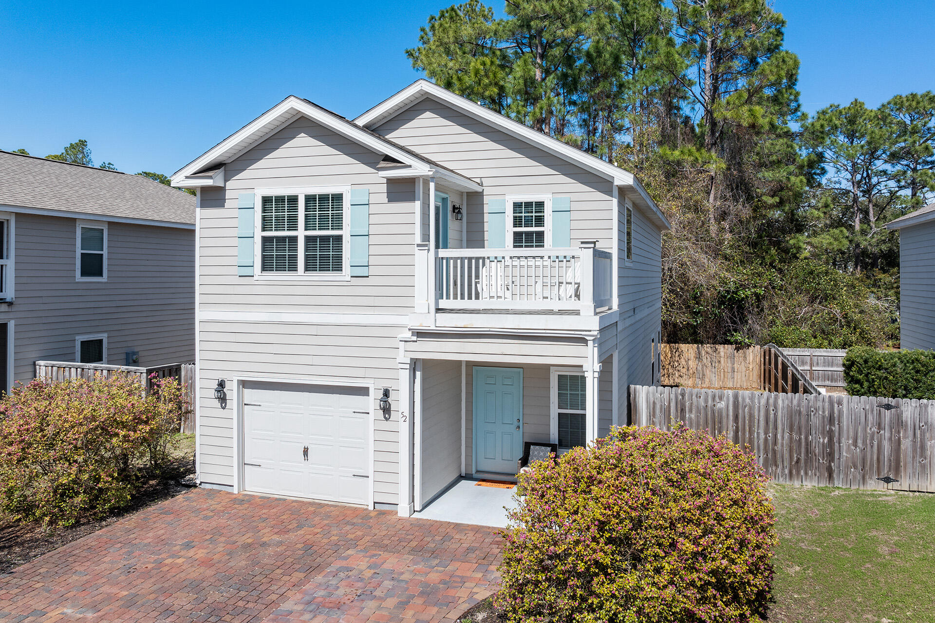 52 Tranquility Lane Santa Rosa Beach, FL 32459 - Photo 5 of 31 a front view of a house with a garden