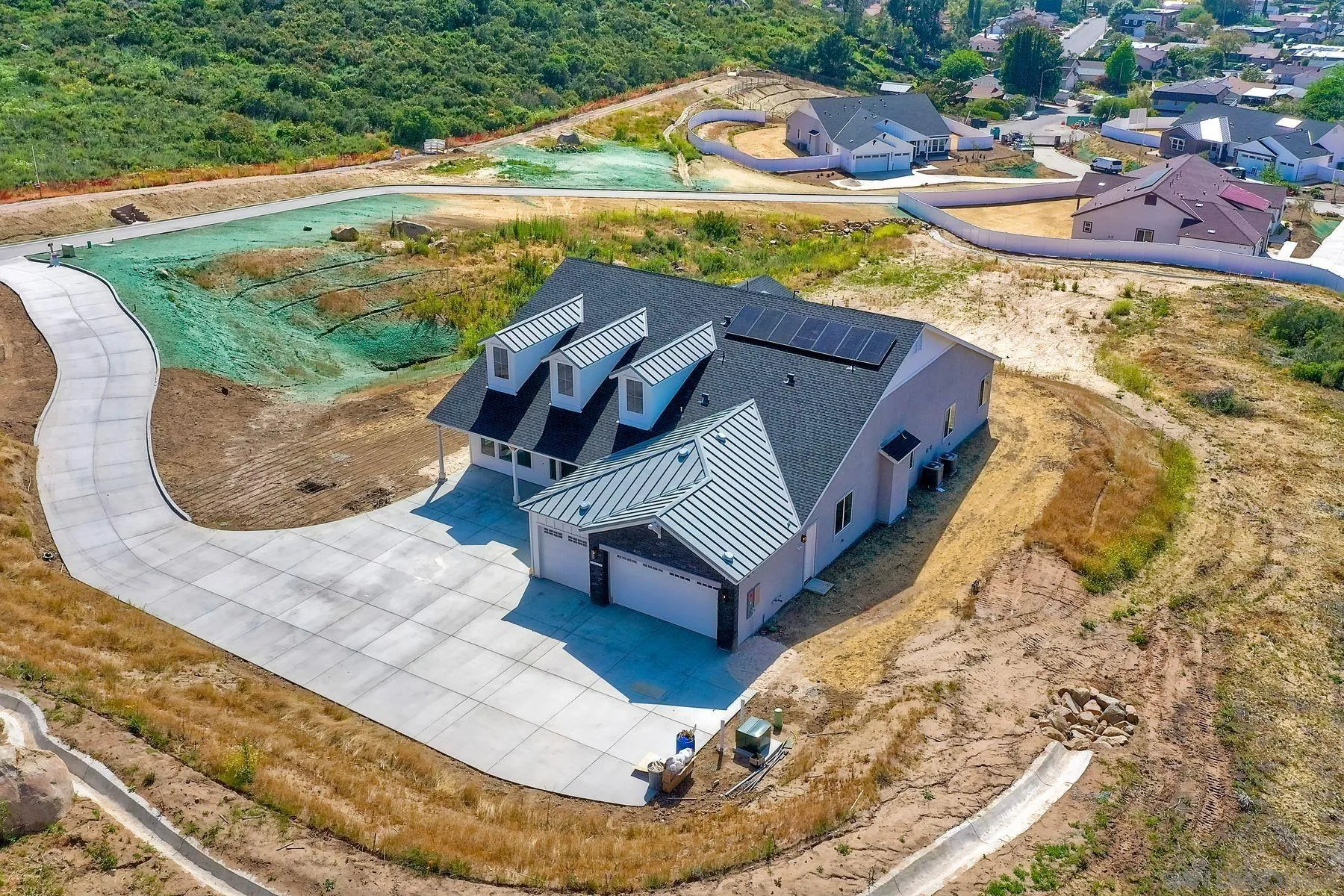 15111 Summit Trail Road Poway, CA 92064 - Photo 2 of 4 a view of a swimming pool with a yard