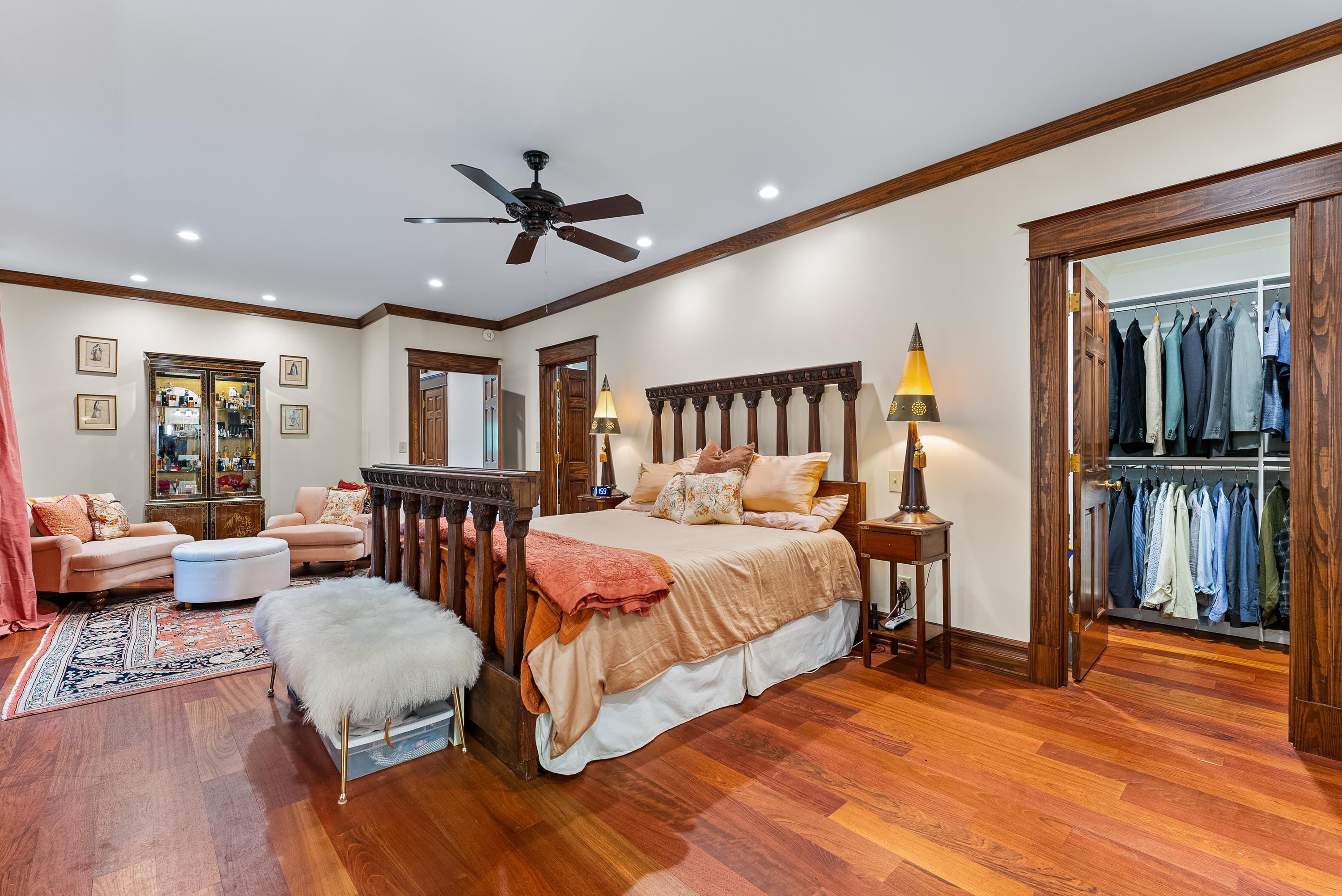 470 Losch Way Somerville, TN 38068 - Photo 7 of 40 a spacious bedroom with a bed a couch and a dresser in it