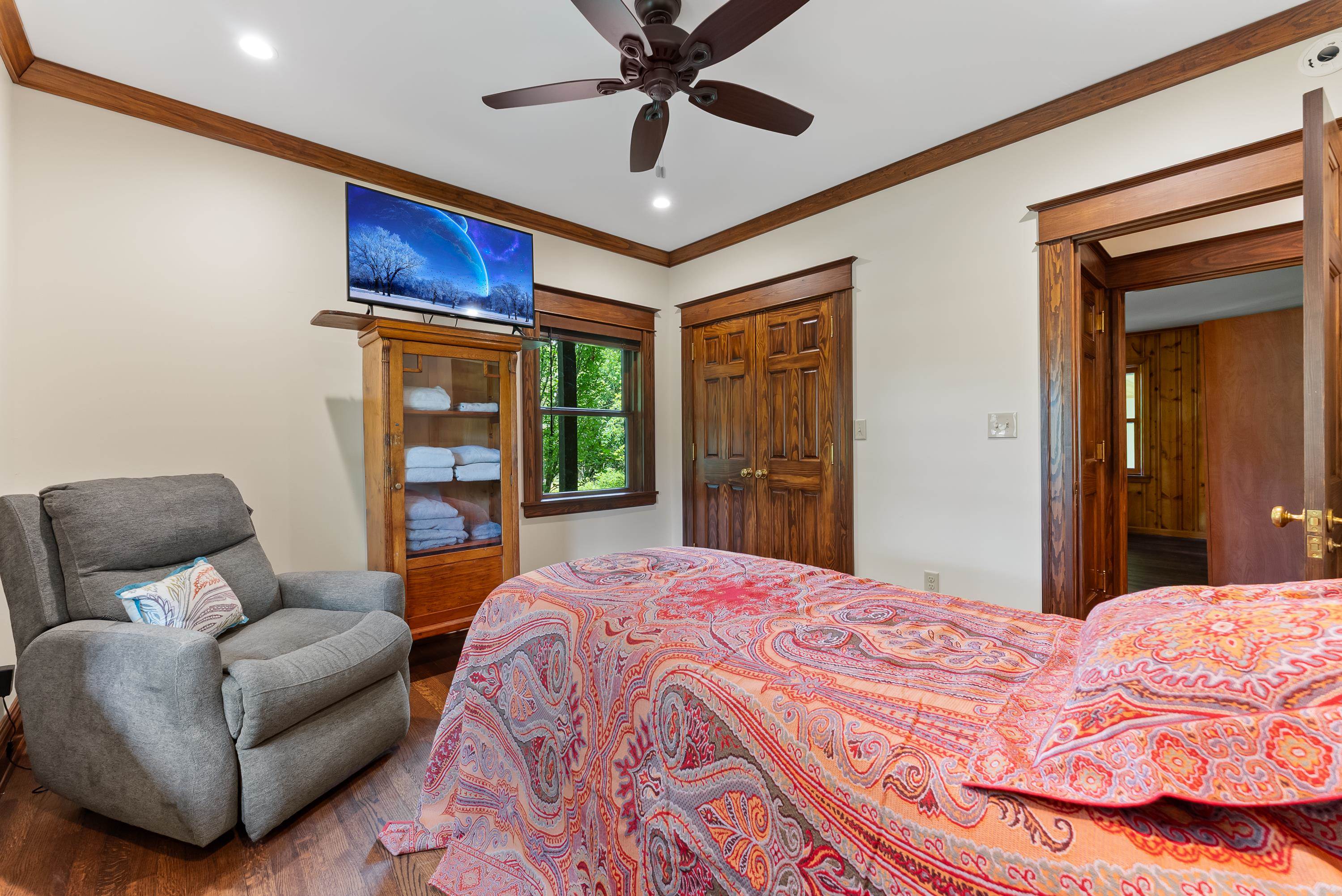 470 Losch Way Somerville, TN 38068 - Photo 9 of 40 a bedroom with a bed couch and a ceiling fan