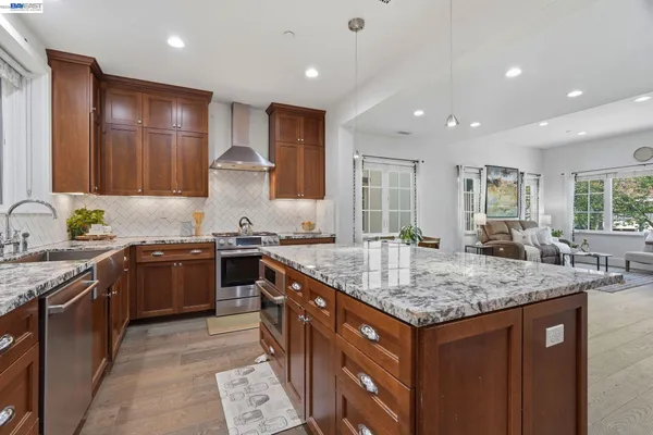 a view of a lake with houses in the back