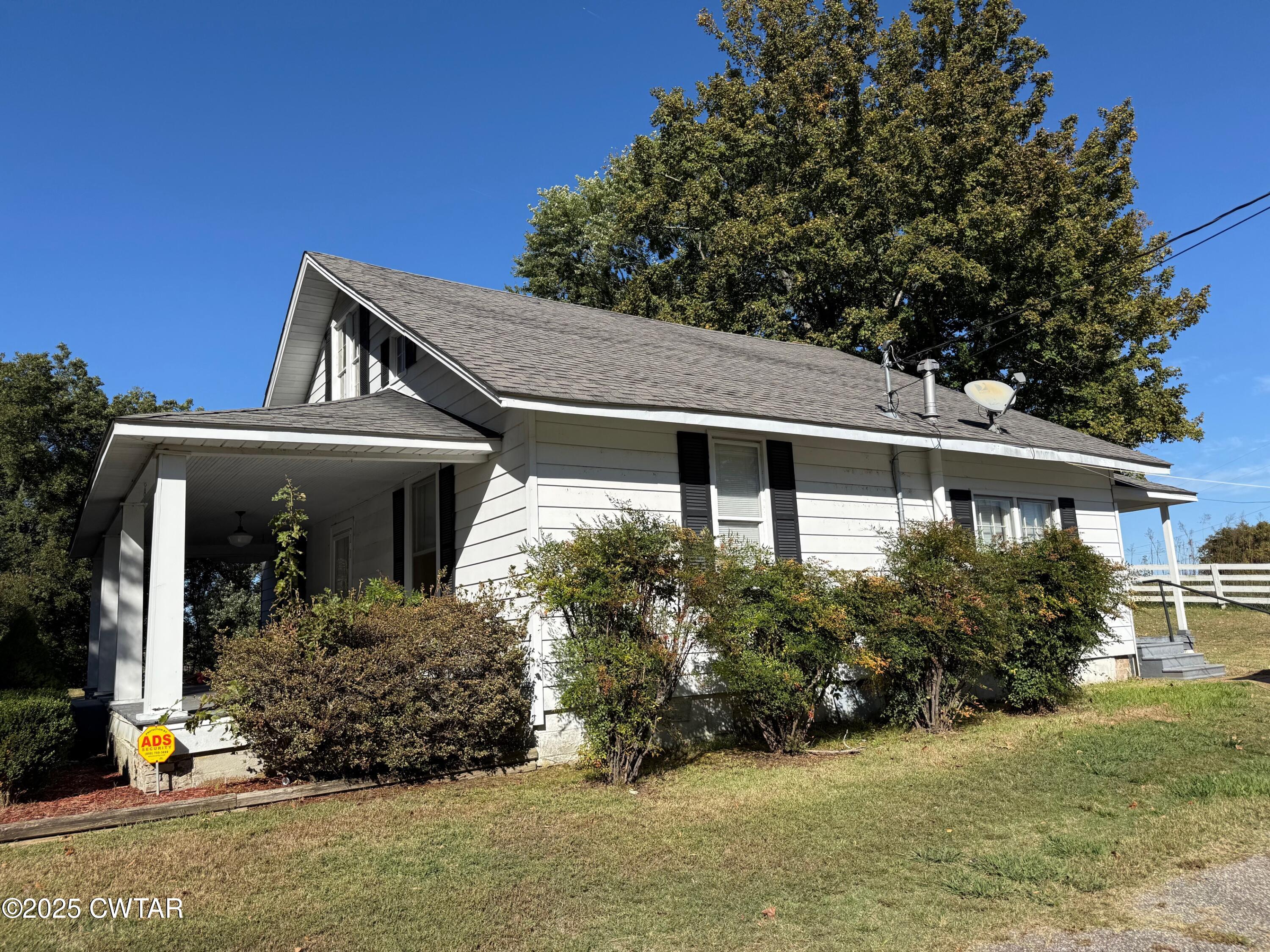 3794 Roellen Newbern Road Newbern, TN 38059 - Photo 12 of 25 a front view of house with yard