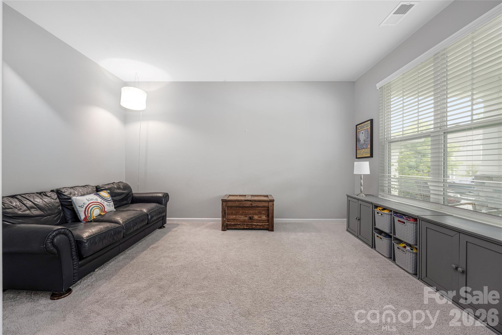17219 Shearer Road Davidson, NC 28036 - Photo 15 of 34 a living room with furniture and window