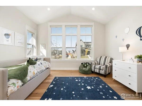 a bedroom with furniture and a bed