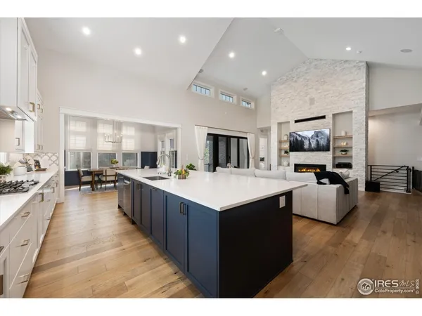 a large kitchen with stainless steel appliances lots of counter top space