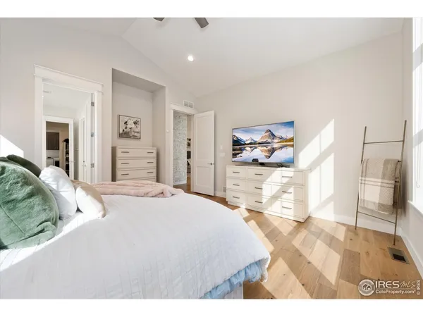 a bedroom with a bed and a cabinets