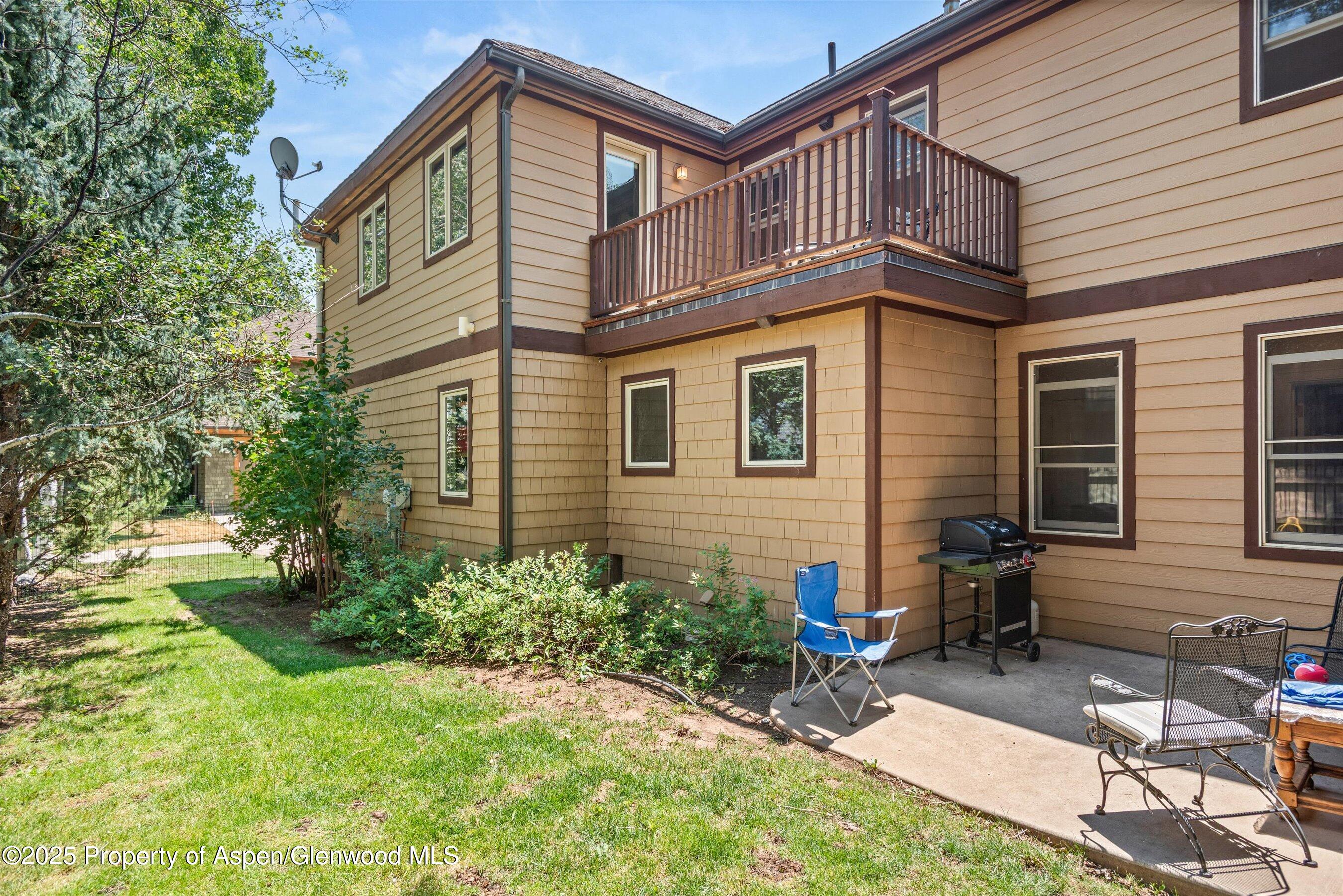 315 Summerset Lane, Unit A Basalt, CO 81621 - Photo 18 of 18 a front view of a house with a yard