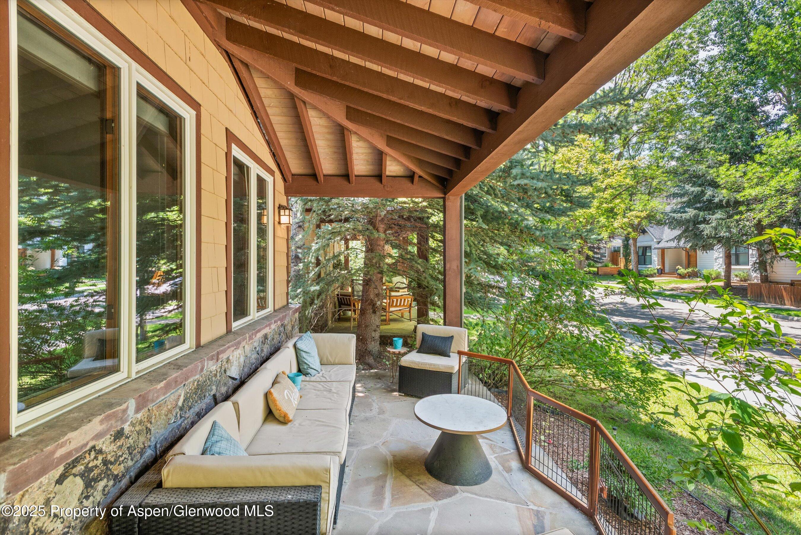 315 Summerset Lane, Unit A Basalt, CO 81621 - Photo 2 of 18 a view of a patio with chairs and a table