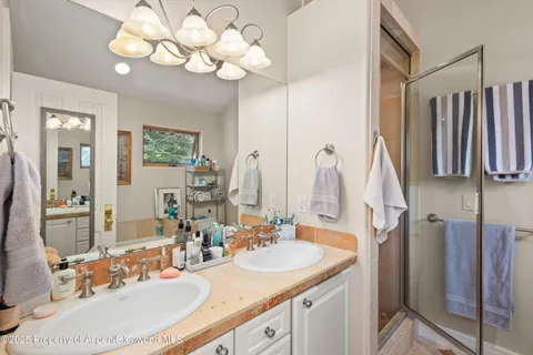 a view of a two chairs in the deck