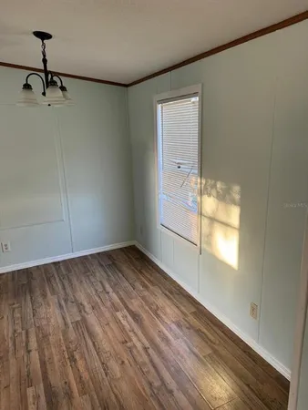 a white refrigerator freezer sitting inside of a kitchen