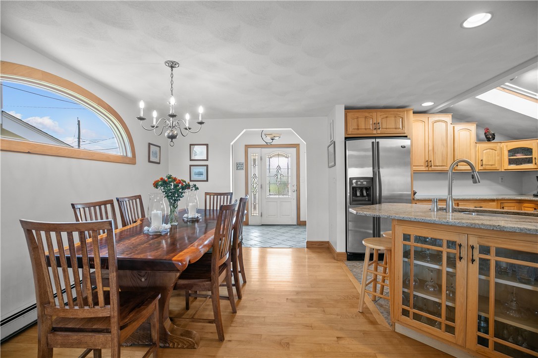 309 Riverside Street Portsmouth, RI 02871 - Photo 7 of 48 Dining Area with View to Kitchen and front door