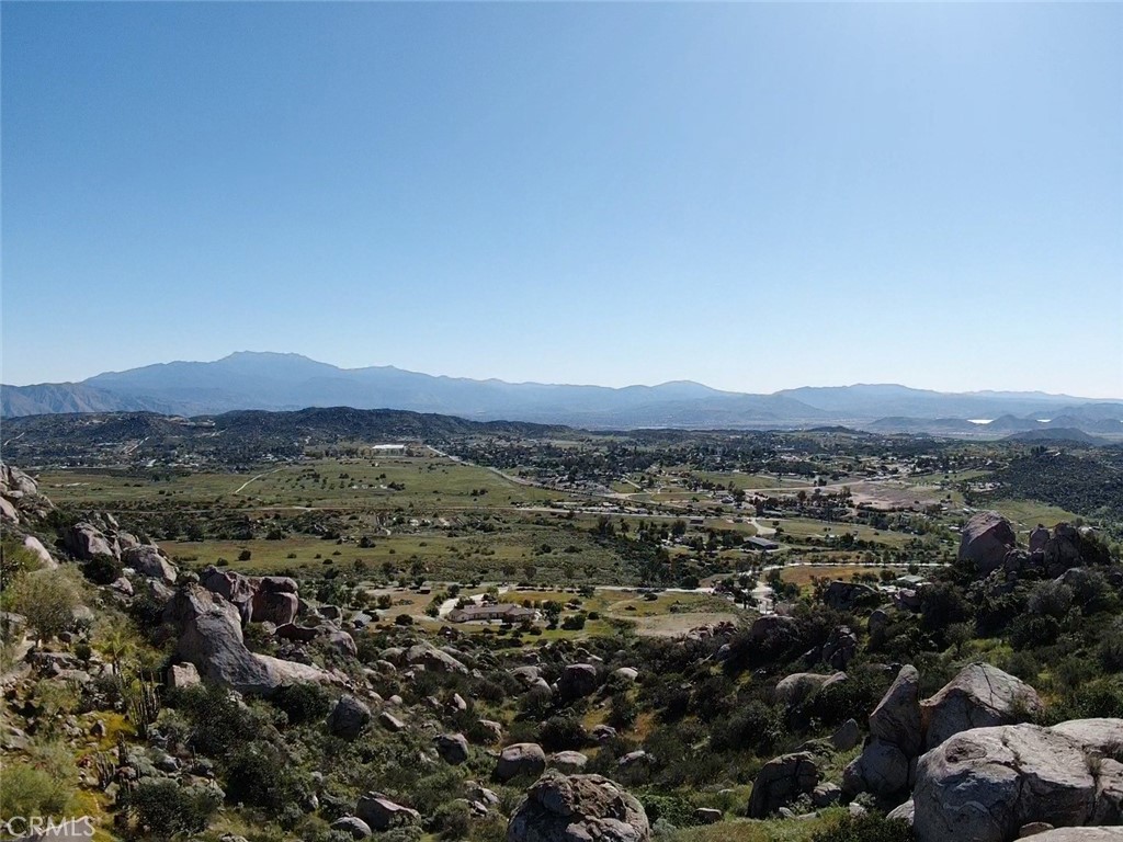 an aerial view of residential house and green space