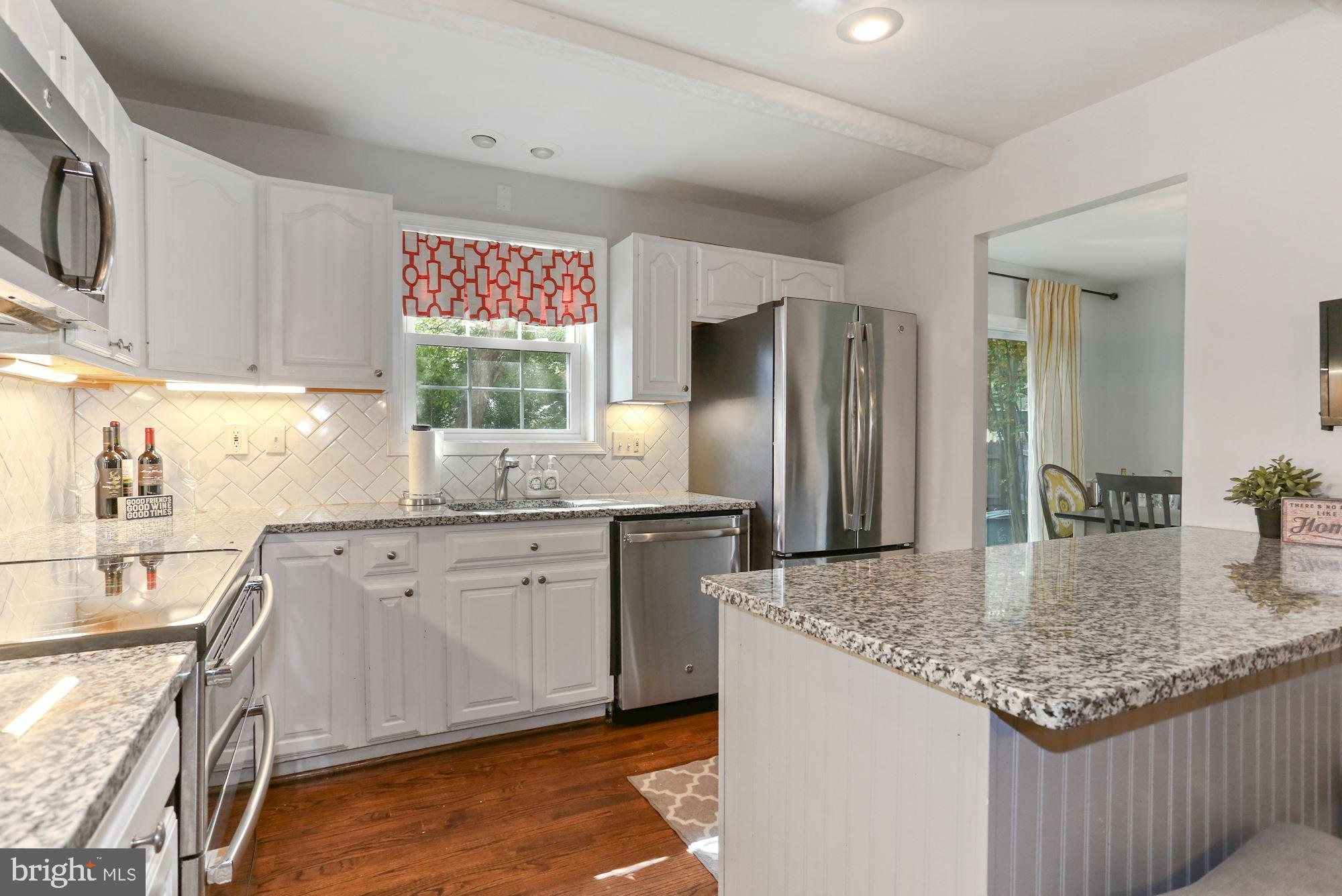 6844 Brian Michael Court Springfield, VA 22153 - Photo 14 of 42 Granite countertops, stainless steel appliances