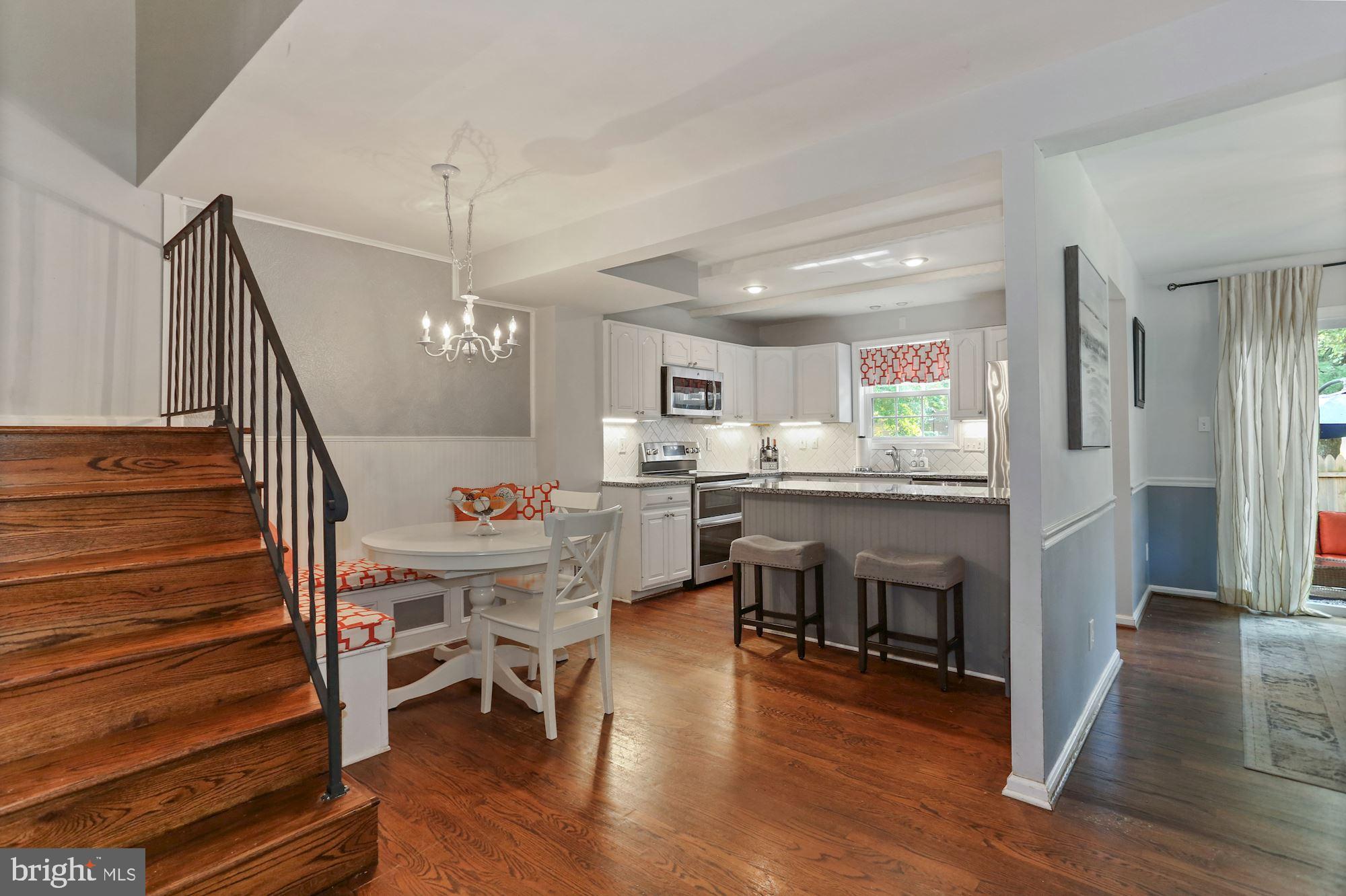 6844 Brian Michael Court Springfield, VA 22153 - Photo 19 of 42 Beautiful view of the main level w/wood on stairs