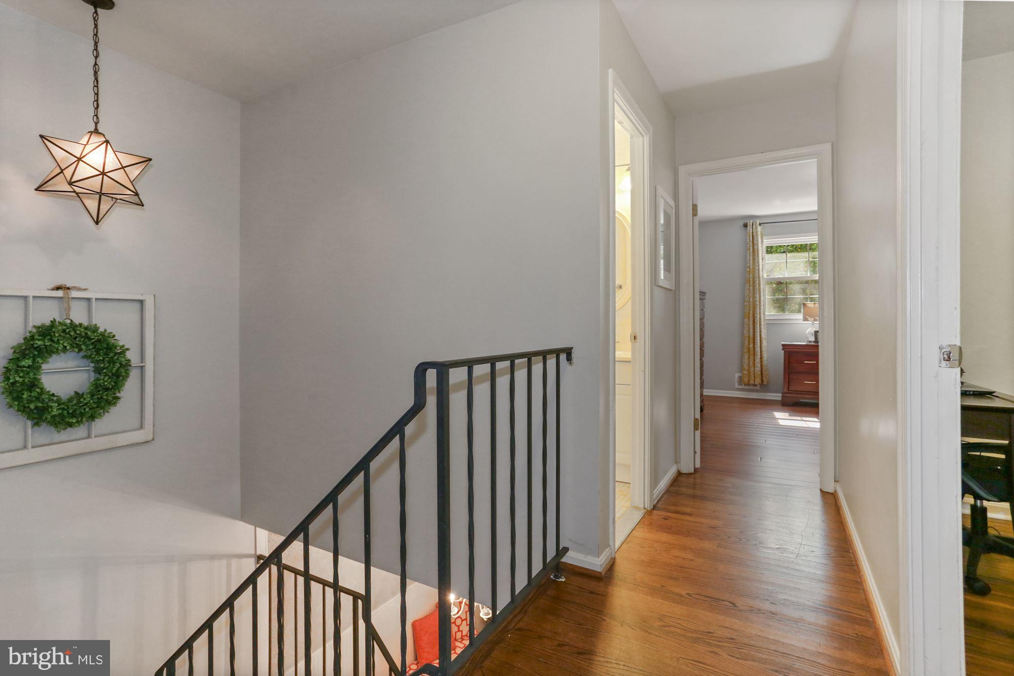 6844 Brian Michael Court Springfield, VA 22153 - Photo 24 of 42 Hardwood floors in upper level hallway
