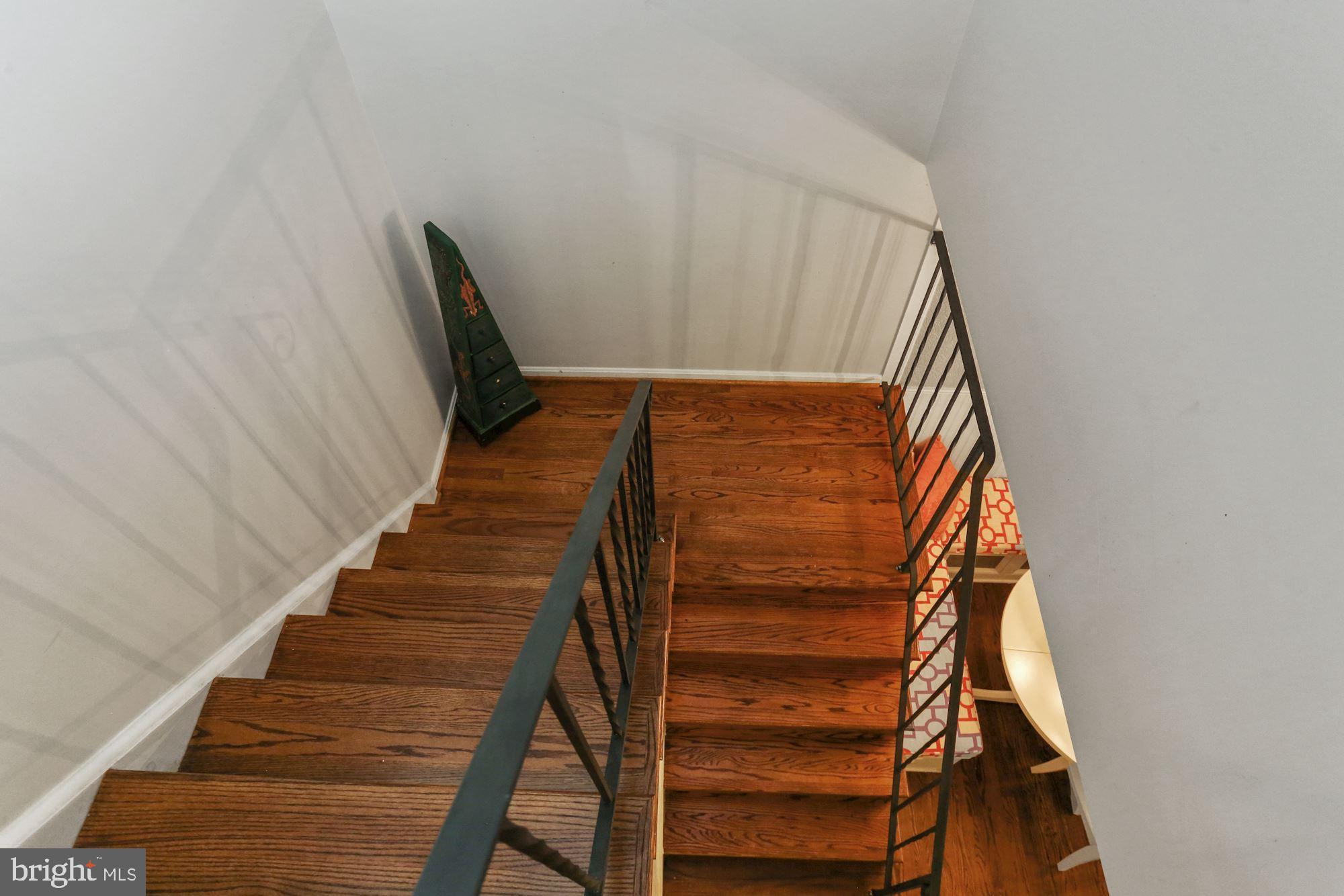 6844 Brian Michael Court Springfield, VA 22153 - Photo 29 of 42 Hardwood on stairs