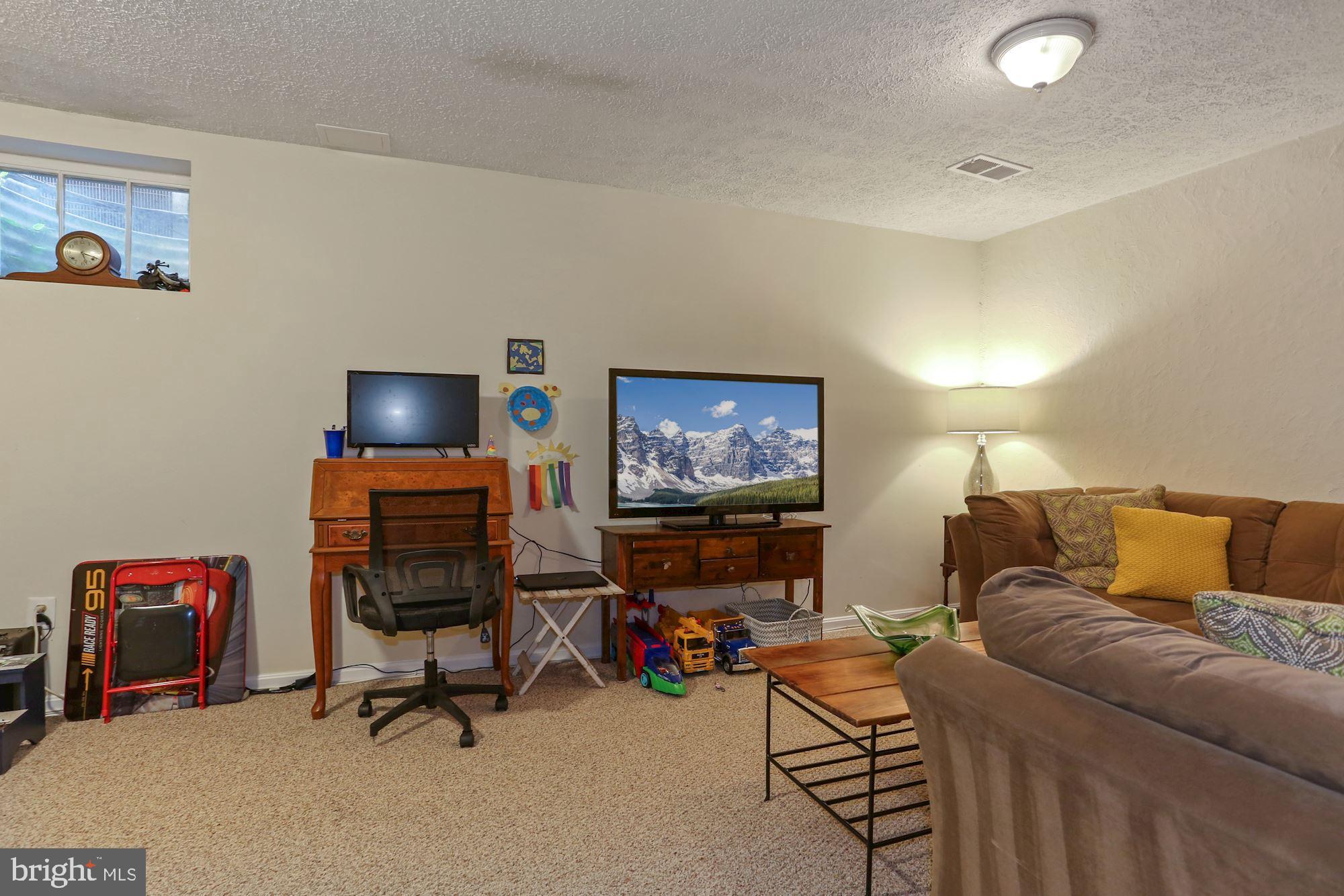 6844 Brian Michael Court Springfield, VA 22153 - Photo 30 of 42 Lower level rec room