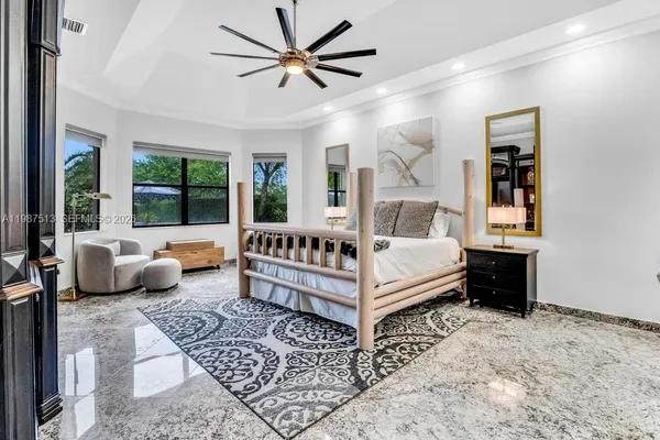 a spacious bathroom with a double vanity sink and a mirror