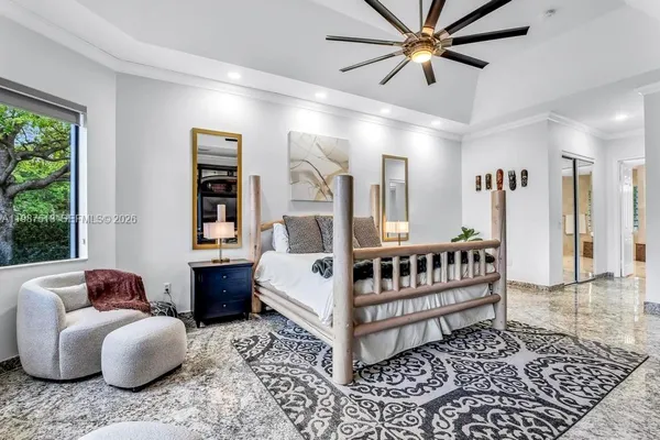a spacious bathroom with a double vanity sink mirror and a bathtub