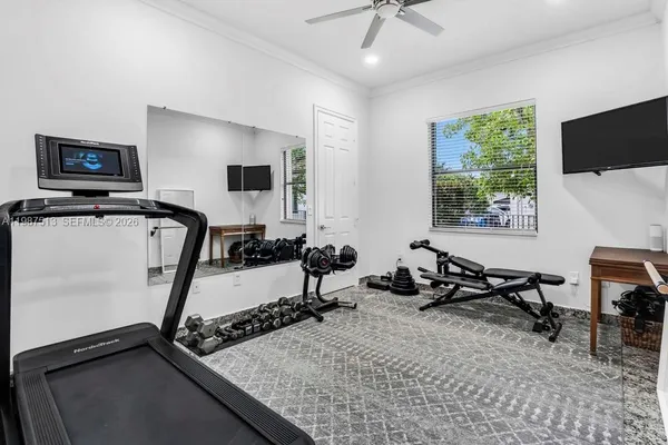 a bedroom with a bed and a couch