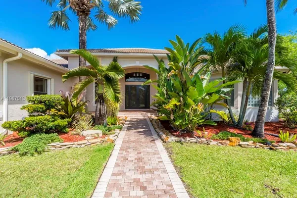 an aerial view of residential house with outdoor space
