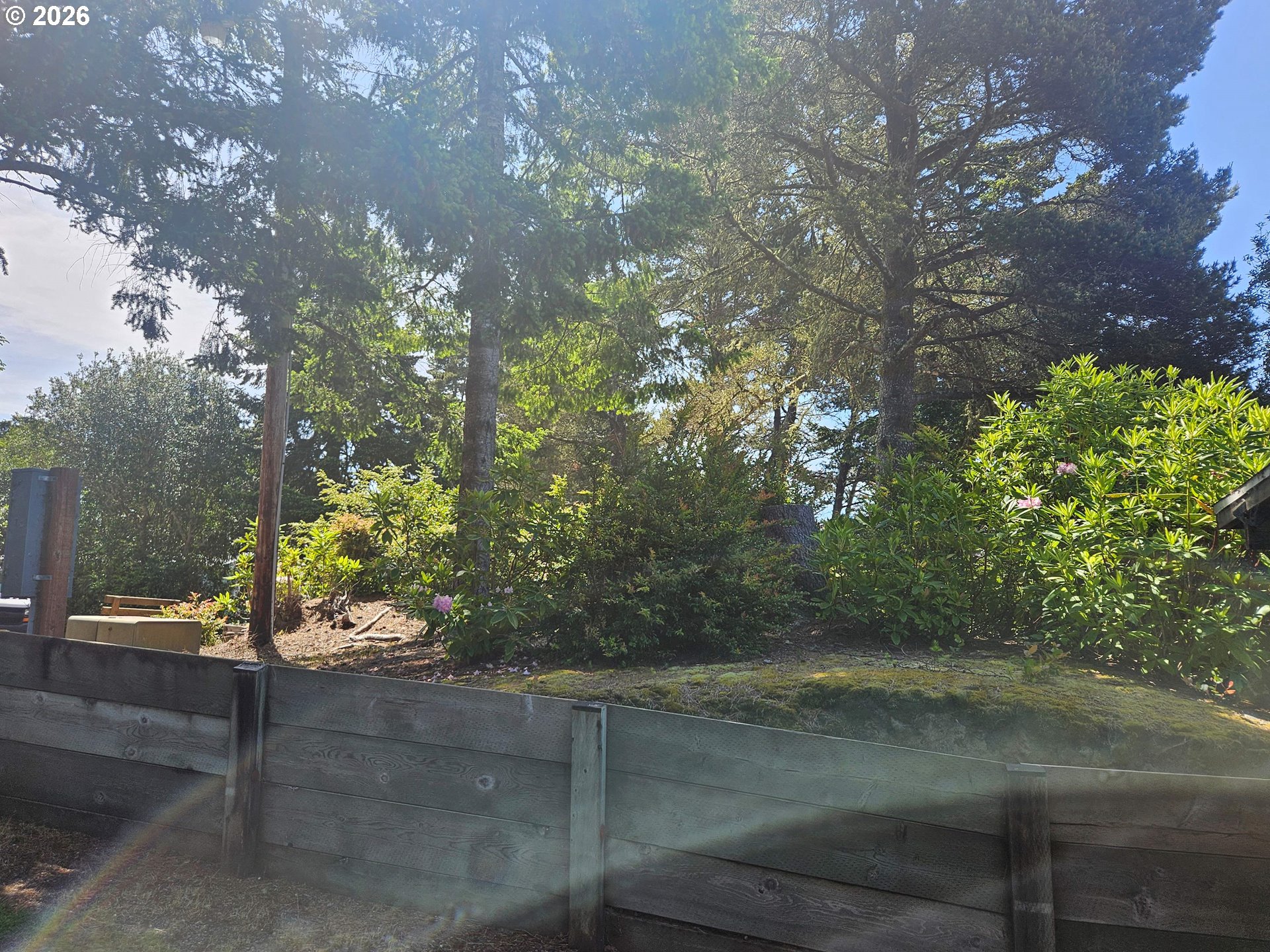 1600 Rhododendron Drive, Unit 214 Florence, OR 97439 - Photo 26 of 38 a view of a yard