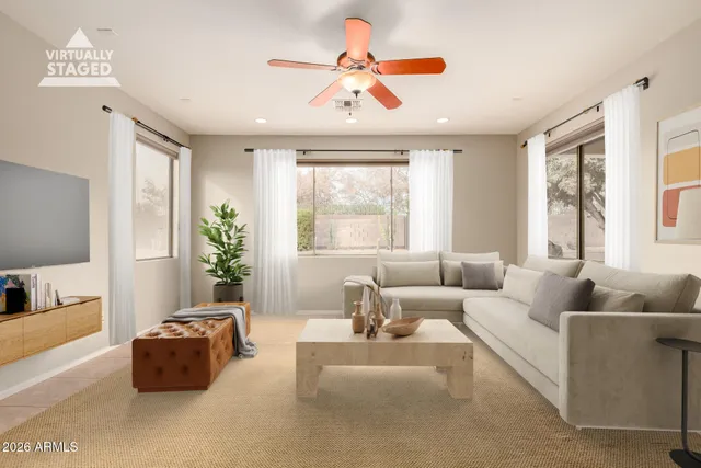 a view of a kitchen with a refrigerator a microwave and a counter top space