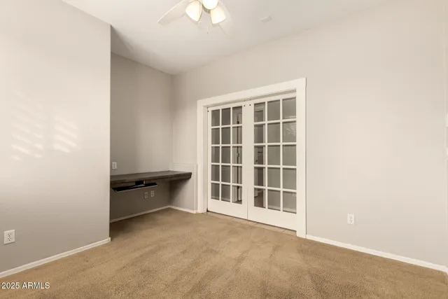 a room with table tennis air hockey table and arcade game machine