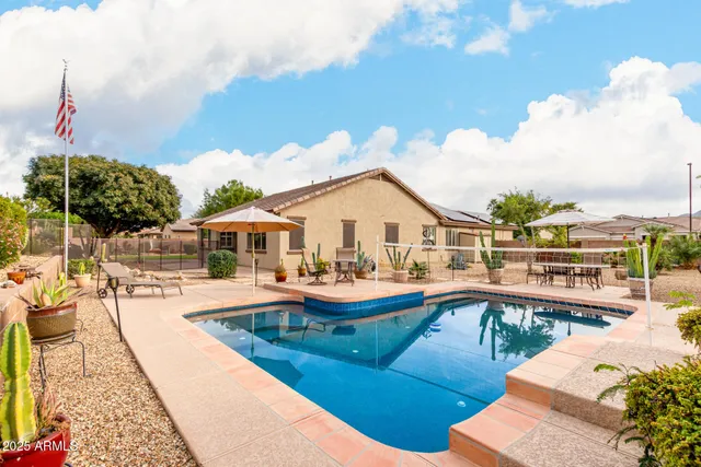 a bathroom with a bathtub and sink mirror