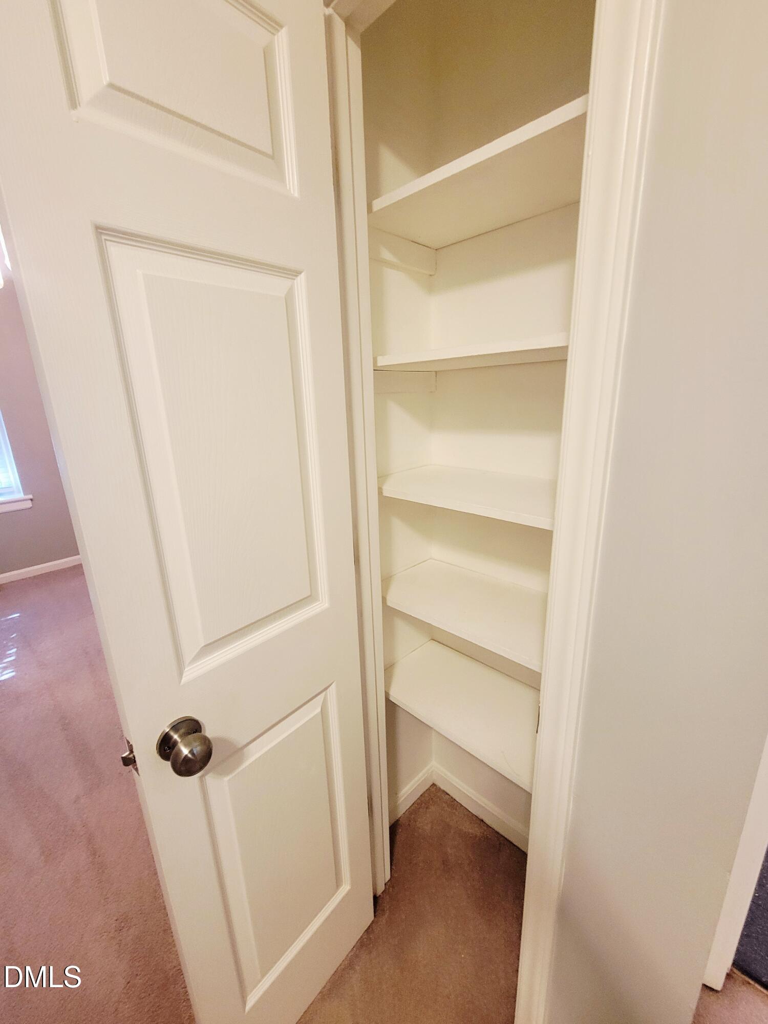 4701 Blue Bird Court Raleigh, NC 27606 - Photo 30 of 42 a view of a walk in closet