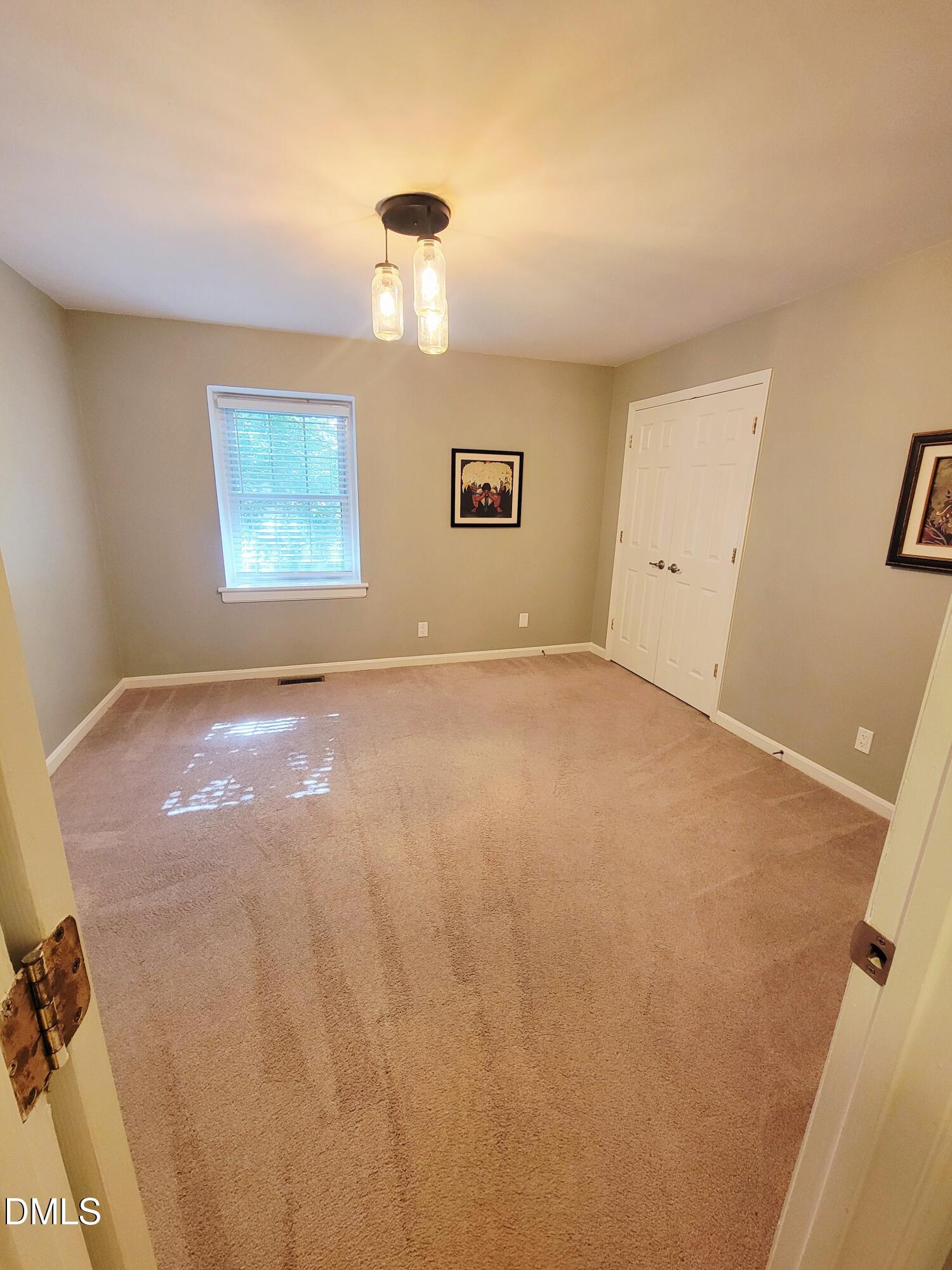 4701 Blue Bird Court Raleigh, NC 27606 - Photo 31 of 42 a view of an empty room