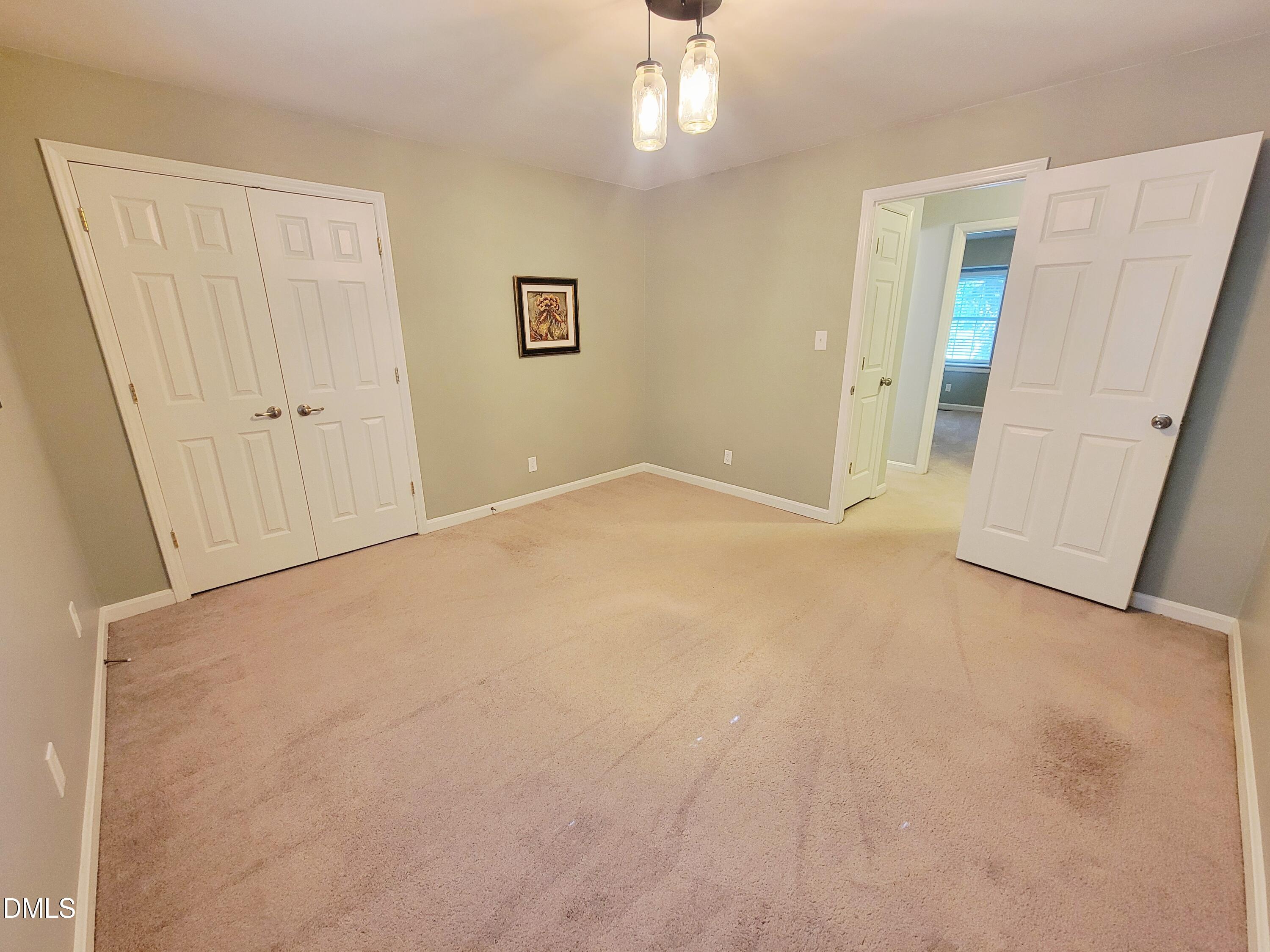 4701 Blue Bird Court Raleigh, NC 27606 - Photo 33 of 42 a view of an empty room with a window