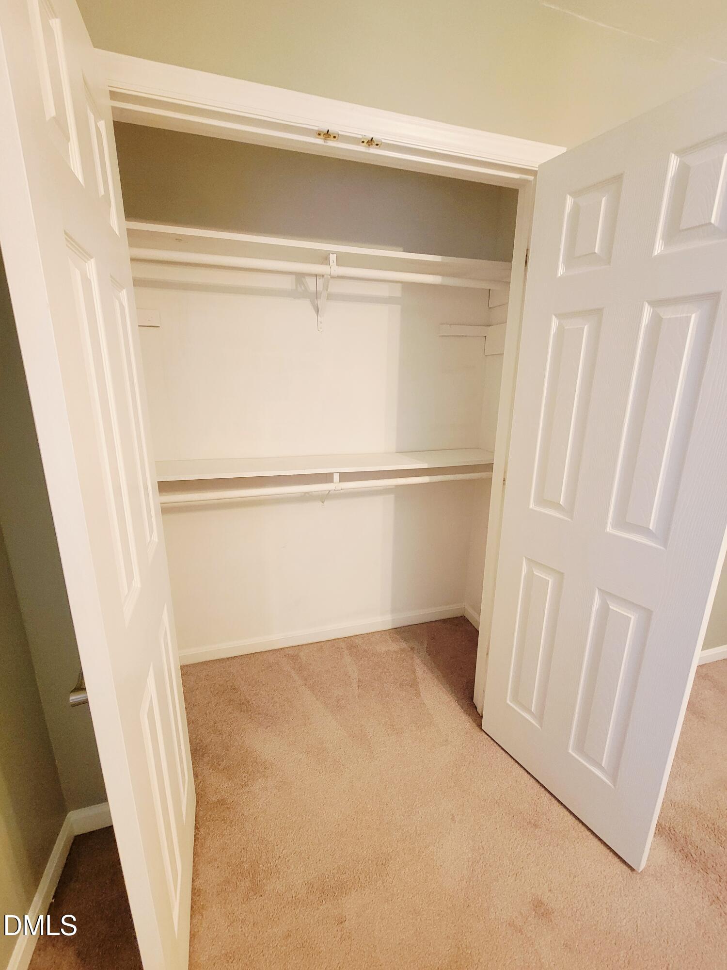 4701 Blue Bird Court Raleigh, NC 27606 - Photo 36 of 42 a view of an empty walk in closet