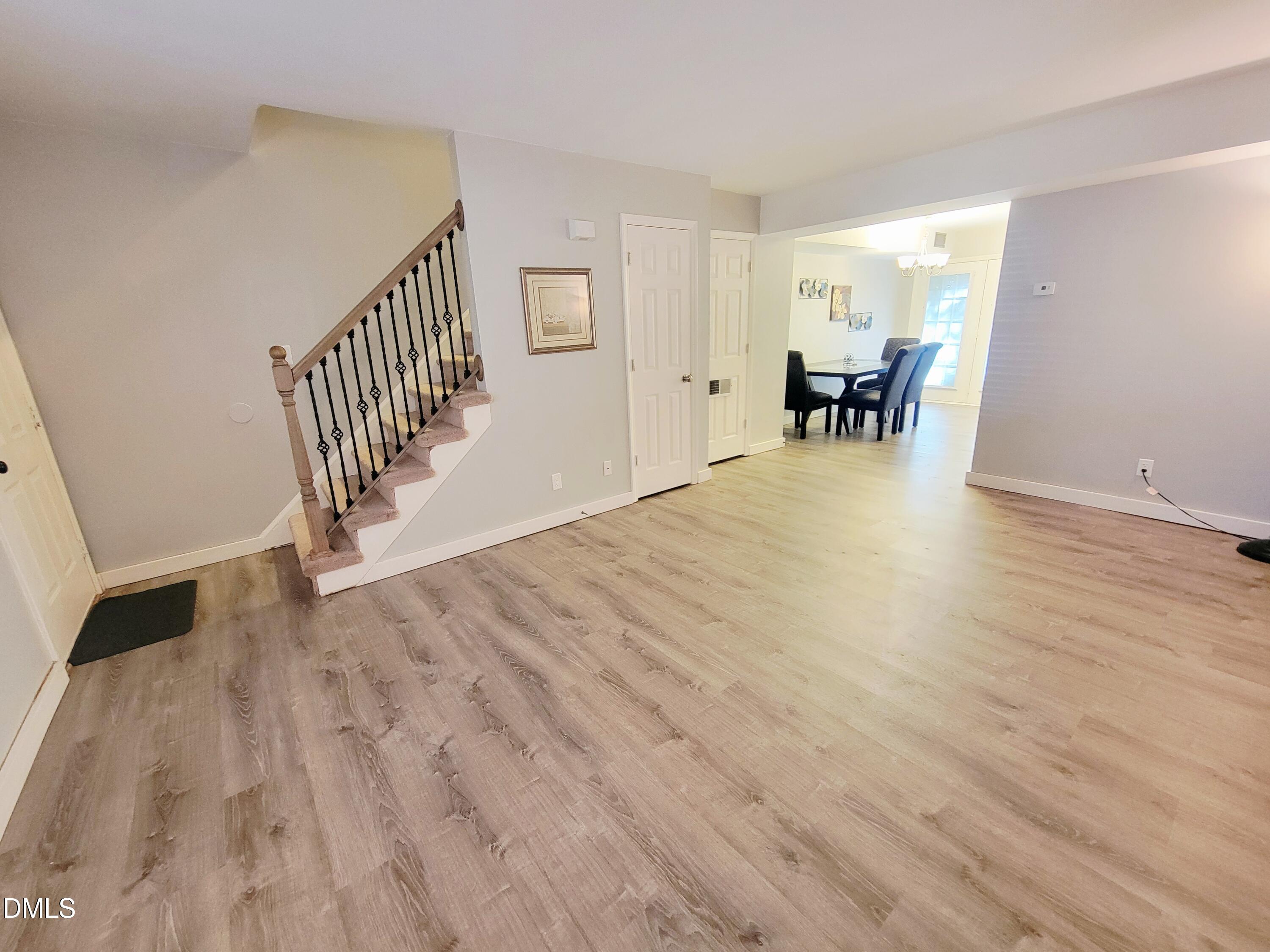4701 Blue Bird Court Raleigh, NC 27606 - Photo 4 of 42 a view of livingroom with furniture and wooden floor