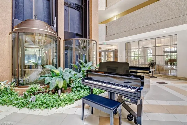 a outdoor view of a house with sitting area