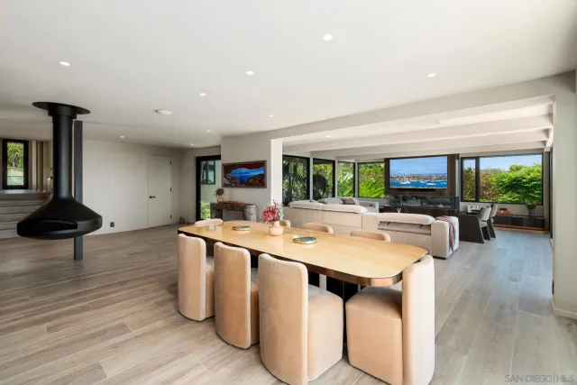 a kitchen with a table and chairs in it