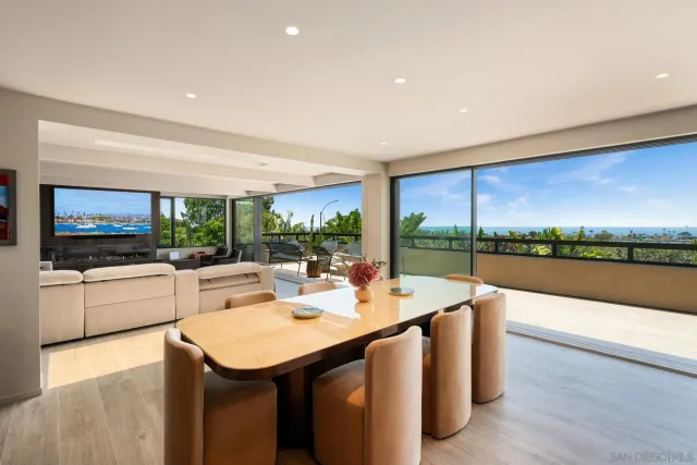 a kitchen with a table and chairs in it
