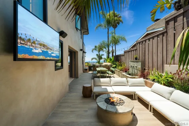 a kitchen with kitchen island a large window in it