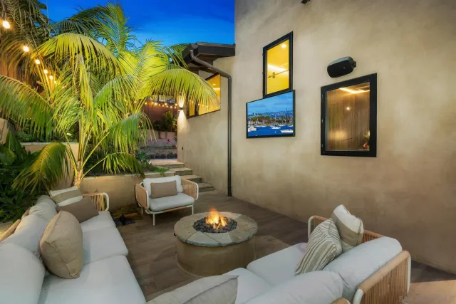 a view of a chairs and table in a patio