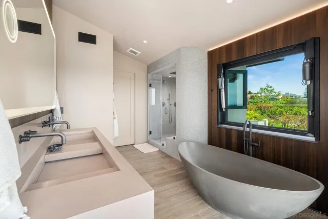 a utility room with sink dryer and washer