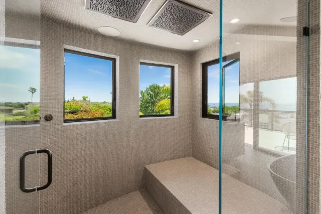 a view of a house with a flower garden