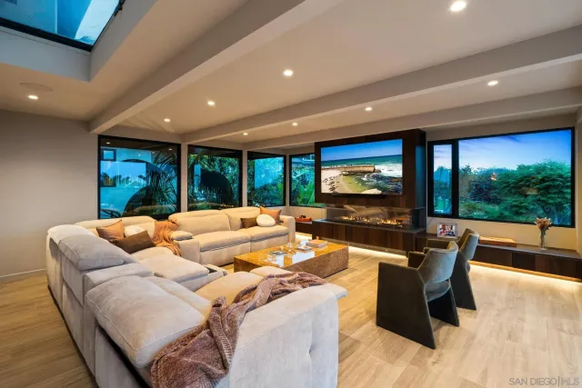 a large kitchen with a table and chairs