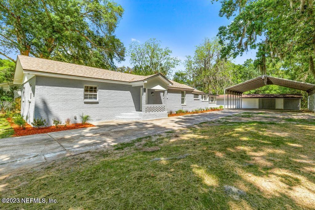 9977 Sibbald Road Jacksonville, FL 32208 - Photo 1 of 25 Front