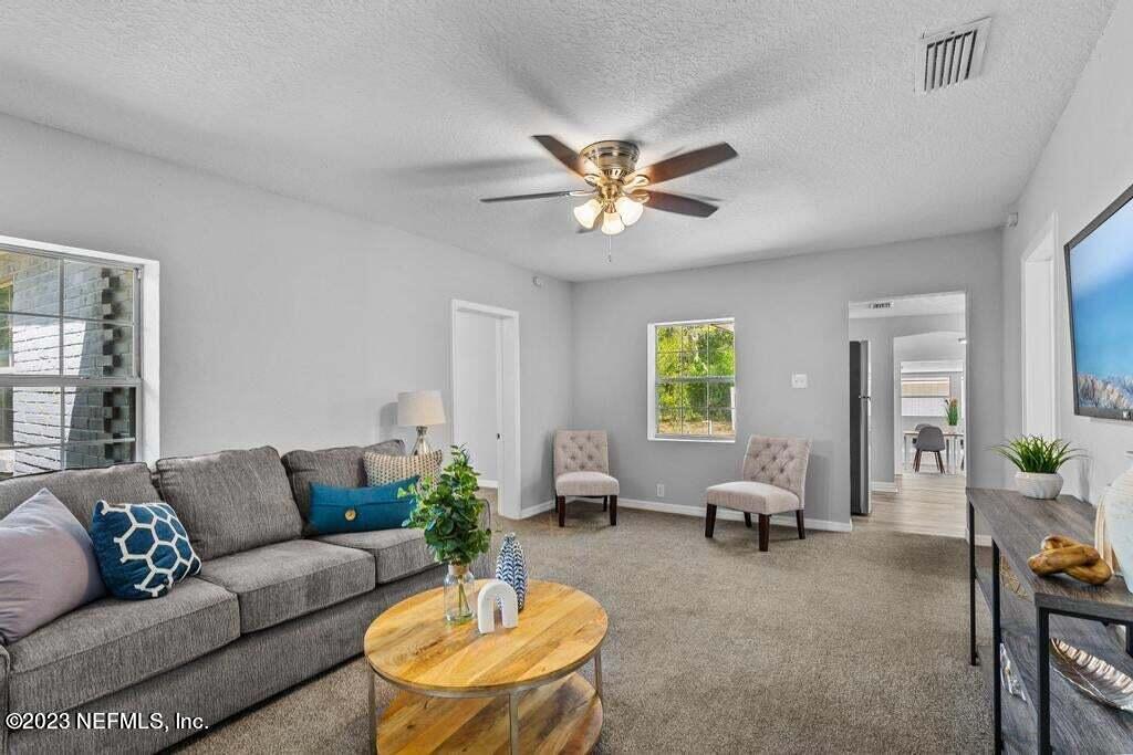 9977 Sibbald Road Jacksonville, FL 32208 - Photo 15 of 25 family room 2